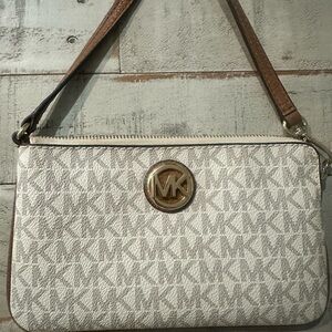 Michael Kors Cream wristlet w/ Gold Logo